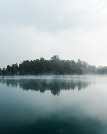 Foggy Lakeside Reflection