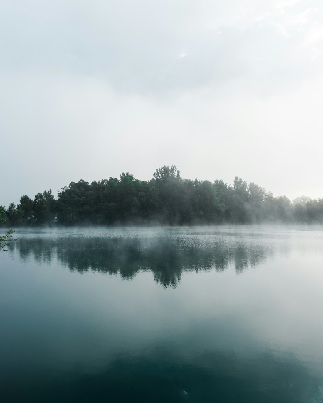 Foggy Lakeside Reflection